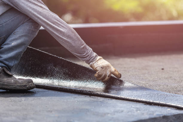 Professional Exterior Waterproofing technician working in New Era, MI